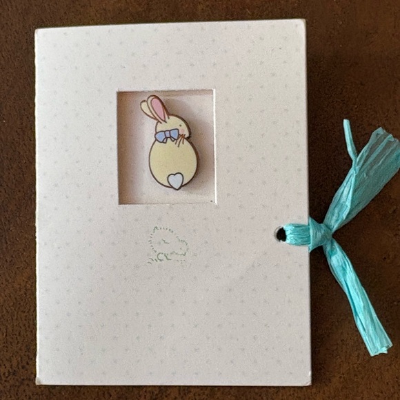 Tiny little bunny pin with pink ears, a blue bow, and white “heart” cottontail - Picture 12 of 12